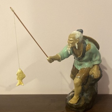 Porcelanowa Figurka Rybak z Wędką