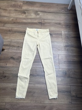 Spodnie jeansowe pastelowo żółte RIVER ISLAND 8/36