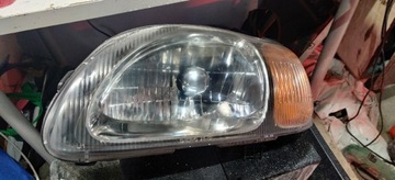 Lampa przednia Suzuki Baleno lewa 