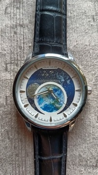 Zegarek z motywem nocnego nieba i Ziemi 