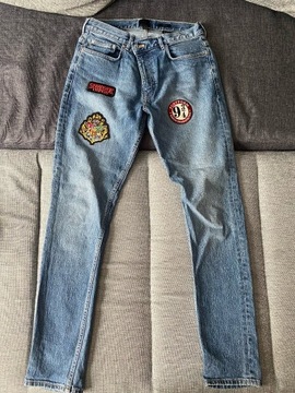 Spodnie jeansy skinny fit H&M z naszywkami rozm.31