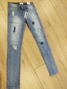 Spodnie jeans 34 36 dziury łaty