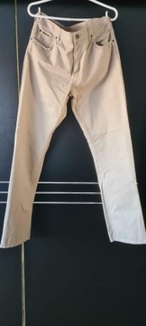 Kremowe spodnie jeansy rozmiar W33 L34 Maverick