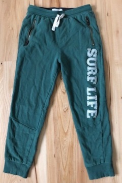 Reserved zielone bawełniane spodnie dresowe 146