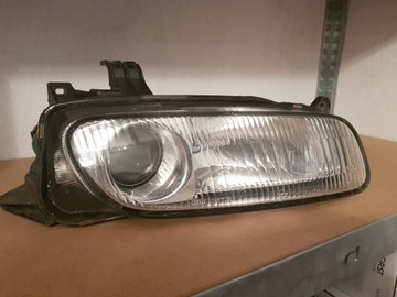 Lampa prawa przód Mazda 323F BA 1997 b.dobry stan