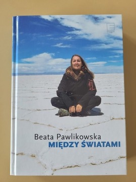 Między światami Beata Pawlikowska