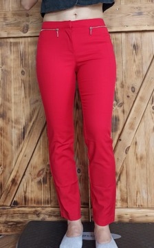 Eleganckie czerwone spodnie z zamkami cygaretki