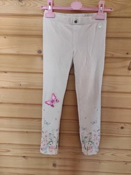 H&M spodnie legginsy kwiaty motylki pudrowe 134