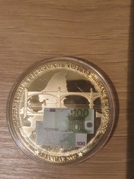 Duzy numizmat platerowany zlotem z banknotem100€ 