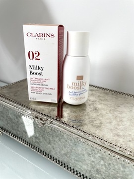 Clarins mleczko upiększające 02 podkład