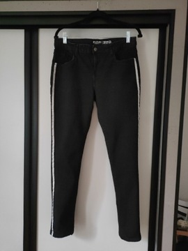Czarne spodnie jeansy wąskie Beloved L 