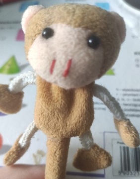 Zabawka małpka na patyku