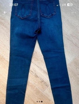 Calvin Klein granatowe spodnie jeans rozm W27xL30