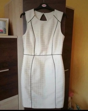 Kremowa sukienka z rozcięciem na plecach H&M L/40