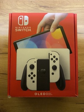 Nintendo Switch OLED + gry + etui