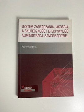 System zarządzania jakością a skuteczność Modzelew