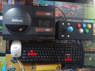 Commodore Amiga CD32+Riser+Terrible Fire 328