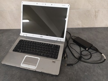Laptop HP Pavilion dv6000 sprawny z pasami na ekr.