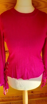 Fantazyjny różowy sweter