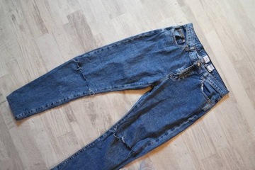 Calvin Klein spodnie jeansowe CK M dziury