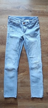 Skinny jeansy 128 przetarcia h&m