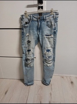 Spodnie z Dziurami przetarciami Cropp Slim r 32/32