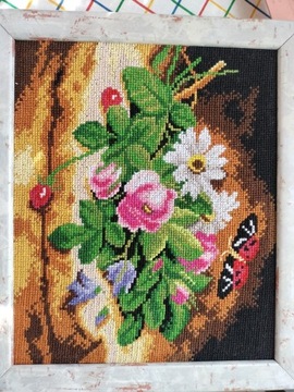 Obraz kwiaty z motylem