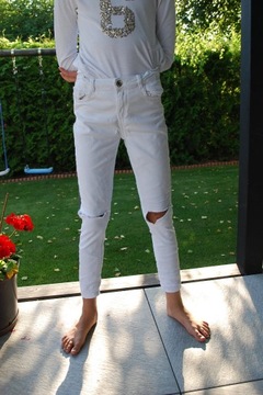 Spodnie białe jeansowe Reserved 140