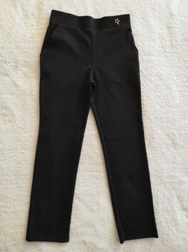 Czarne eleganckie spodnie dresowe gwiazdka 122 128