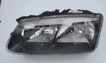 REFLEKTOR LEWY RENAULT SAFRANE NOWY OE 7701686824