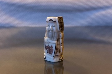 Netsuke - Mędrzec ze zwojem - Japonia XX w. 