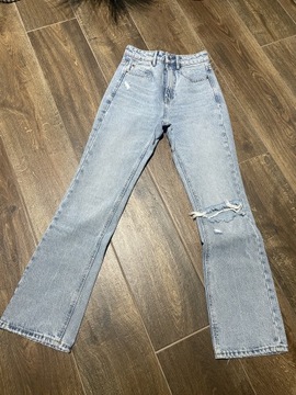 Stradivarius-jeansy z dziurkami 32Nowe bez metki! 