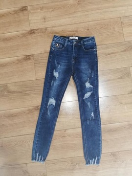 Jeans z przetarciami różne rozmiary