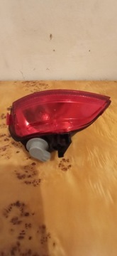 Lampa p-mgielna tylna Lewa Dacia Duster.