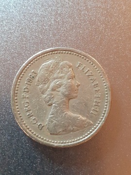 Moneta One Pound z roku 1983r odwr.napis