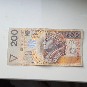 Kolekcjonerski banknot 200 zł, rosnąca czcionka AM