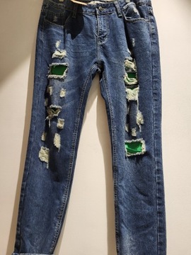 Spodnie dżinsowe  z zielonymi wstawkami 40