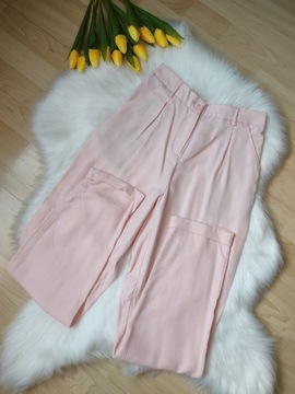 Luźne eleganckie różowe spodnie Mohito roz.S