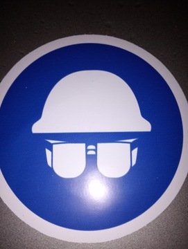 Znak ISO (BHP) Nakaz stosowania ochrony głowy i oczu 