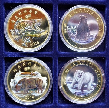 N.KOREA -4x 20 won 2011/ 14-bi-metal+kolor-PP