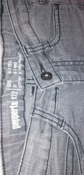 Spodnie jeansy jasno-szare wycierane r. 122 