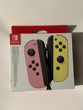 Nintendo Switch JoyCon pink yellow
