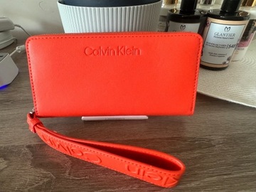 Nowy portfel Calvin Klein pomarańczowy z RFID