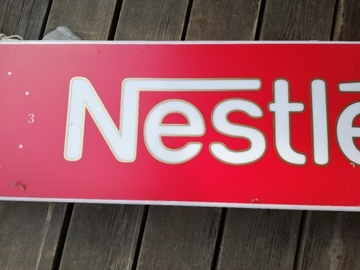 Stara reklama podświetlana z zegarem Nestle 