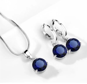 Komplet biżuterii niebieski kamień naszyjnik i kolczyki srebrny kolor 