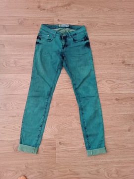 Zielone spodnie jeansowe