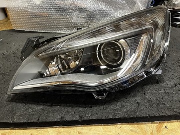 Reflektor lewy Opel Astra J IV bi-xenon skrętny