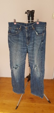 Spodnie levis dżinsy z dziurami W34L32