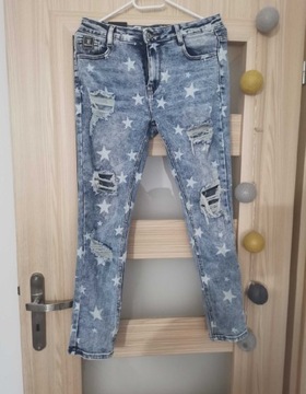 Nowe jeansy z dziurami L