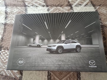 Puzzle Mazda 100 lecie marki 240 ele. 